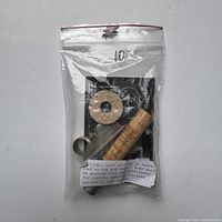 Clear resealable plastic bag containing all parts for a Glenn Struble fly fishing rod reel seat kit.