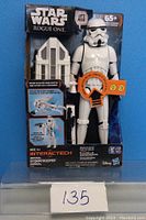 Front view of Star Wars Rogue One Interactech Imperial Stormtrooper action figure in original packaging showing figure and accessory.