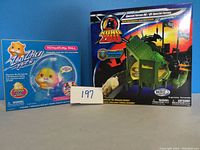 Front view of the Zhu Zhu Pets Adventure Ball boxed set and Kung Zhu Special Forces HQ boxed set.