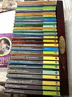 CD spines showing classical composers like Mozart, Mendelssohn, Tchaikovsky, Strauss, Vivaldi, Verdi, Rachmaninov, Puccini, Grieg, Haydn, Debussy, Prokofiev, and Dvořák, all sealed in plastic wrap.