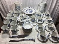 Overview of full blue and white porcelain set on table