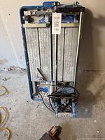 Mastercraft tile saw top-down view showing cutting platform, sliding mechanism and electric motor.