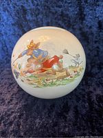 Front view of the Royal Doulton Bunnykins bank showing detailed bunny illustration.