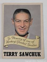 Front side of the 1970-71 OPC Terry Sawchuk Memorial hockey card featuring a portrait and memorial banner.