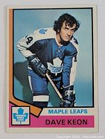 Front view of 1974-75 Topps Dave Keon hockey card showing player in Toronto Maple Leafs uniform with team logo and player name.