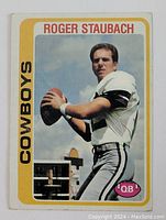 Front photograph of the 1978 Topps Roger Staubach Cowboys football card, showing Staubach in uniform with football ready to throw.