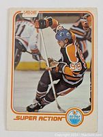 Front image of 1981-82 O-Pee-Chee Wayne Gretzky hockey card in action shot with Edmonton Oilers uniform number 99.