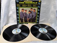 Two black vinyl LPs laid flat showing original RAK label in center. Records appear clean with good condition.