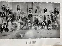 Black and white lithograph print titled 'Road Trip' showing a large group of people in Western-themed costumes posing in front of a rustic building.