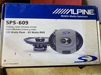 Box with Alpine branding, model SPS-609, specifications 260 Watts Peak, 85 Watts RMS, size 6x9 inches (16x24 cm), Type S series coaxial 3-way speaker system.