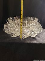 Front and side view of vintage glass punch bowl with 12 hanging cups showing height measurement of about 8 inches