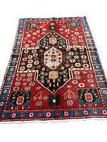 Top-down view of entire rug on white background