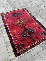 Full rug view at angle showing overall pattern and color