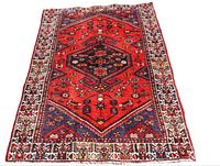 Full frontal view of rug showing field pattern and borders