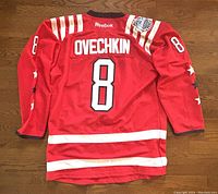 Back view showing OVECHKIN name, #8 and Reebok branding at collar