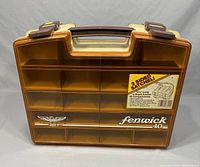 Full view of the Fenwick Woodstream 40 tackle box showing front side with compartments and handle.