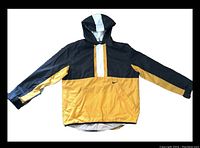 Front view of Nike 1990s men's windbreaker, showing color block design in black, mustard yellow and white, 1/2 zip and hood