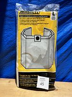 Front side of packaged 2 replacement filter bags for large shop vacuums showing bag image and brand information.