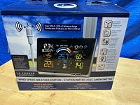 Front box view showing product image and features including 100m wireless range and 3-in-1 sensor capabilities.