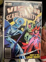Front cover of Vision and Scarlet Witch #1 showing the title, characters, and price; some wear visible on cover.