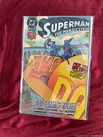Comic book titled Superman The Man of Steel issue #30 featuring cover art with Superman and Lobo characters in action poses, sealed in protective sleeve.