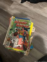Top view of the Wonder Woman comic book on top of a stack of comics.