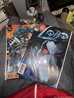 Two Lobo comic books, issue #1, showing front covers clearly with art and price points.