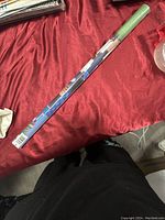 Poster rolled tightly inside original sealed plastic wrapper, showing colorful 1993 World Series graphics and Blue Jays logos on the packaging.