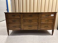 Front view showing full 9-drawer dresser