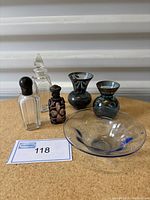 Front view of all six Victorian and vintage glass pieces arranged with inventory card