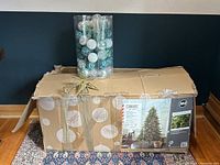 Original packaging box showing Canvas Holiday Oxford Liberty Pine 9ft tree details