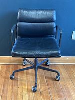 Front view of Soft Pad Management chair showing seat cushion and base