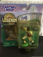 Front view of Gale Sayers figurine in original Starting Lineup packaging with Hall of Fame Legends branding.