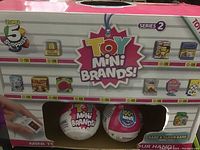 Front package view of the Toy Mini Brands Series 2 showing two surprise balls and brand logos