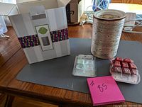 Scentsy wax warmer with box and two wax melt packs visible, showcasing the burner and partially used melts.