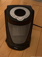 Front view of Bellagio black digital ceramic heater showing mesh grille and brand name