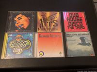 Front view of 6 CD albums arranged in two rows showing album artwork and titles.