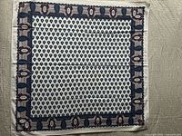 Full view of the Souleiado vintage scarf showing the overall pattern and condition.