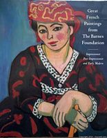 Photo of the art book cover showing a colorful painted portrait and title text.