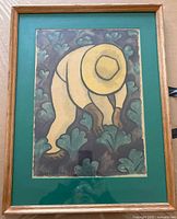 Framed watercolor print showing figure harvesting cabbages, signed Diego Rivera lower left, wood frame with glass and dark green matting.