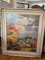 Frontal view of the framed oil painting on canvas board