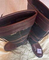 Overhead view showing both boots, interior lining and size marking