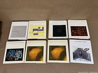 Photo showing 8 book covers in the Scientific American Library Series with scientific and artistic cover images including Discovering Enzymes, The Animal Mind, and others.