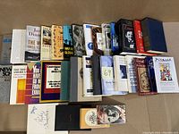 Overview of all 30 books arranged side-by-side showing titles and covers