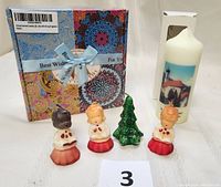 Image showing all candles: three vintage choir singers, pine tree candle, boxed set of new scented candles, and the German pillar candle.