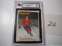 Front view of the 1978-79 O-Pee-Chee #3 Guy Lafleur Highlights hockey card graded 6 (ENM) by HSA showing Guy Lafleur skating and card title.