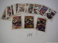 Front view of 20 Marvel comic books from 1991, laid out in a fan style showing various titles and covers.