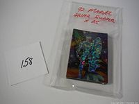 Clear plastic bag with 25 Silver Surfer cards showing holographic Silver Surfer figure with surfboard against cosmic background, labeled '92 MARVEL SILVER SURFER x 25'.