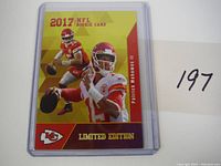 Front of the 2017 Rookie Gems Patrick Mahomes II football card in protective sleeve showing player images and text (yellow, red background).