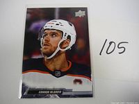 Front view of the 2022-23 Upper Deck Connor McDavid hockey card showing the player's portrait and name with Upper Deck logo.
